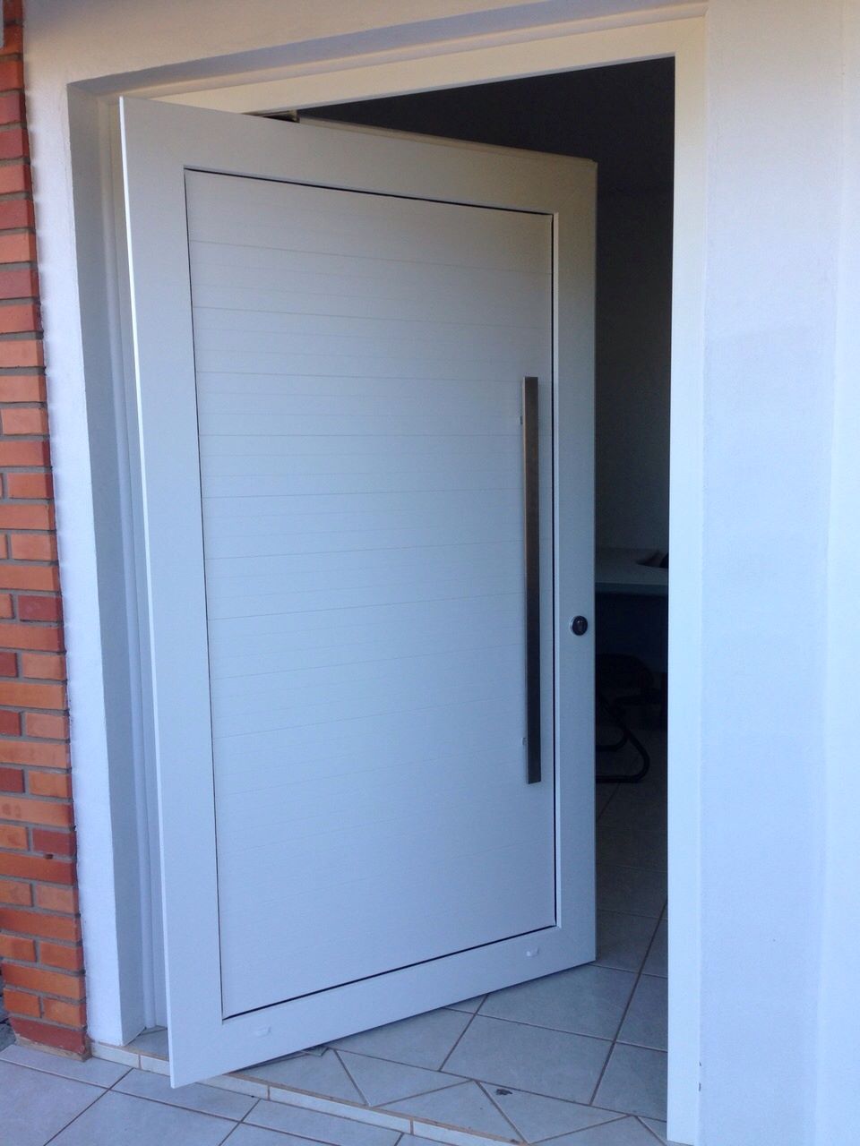 Porta pivotante de pvc